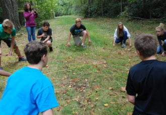 Adventure camp team building exercise.