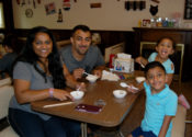 Young family eating ice cream.