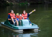 A young family on a peddle boat.