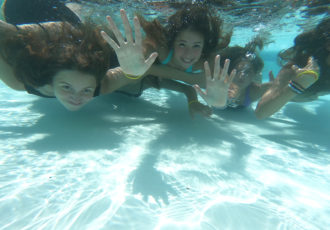Kids swimming.